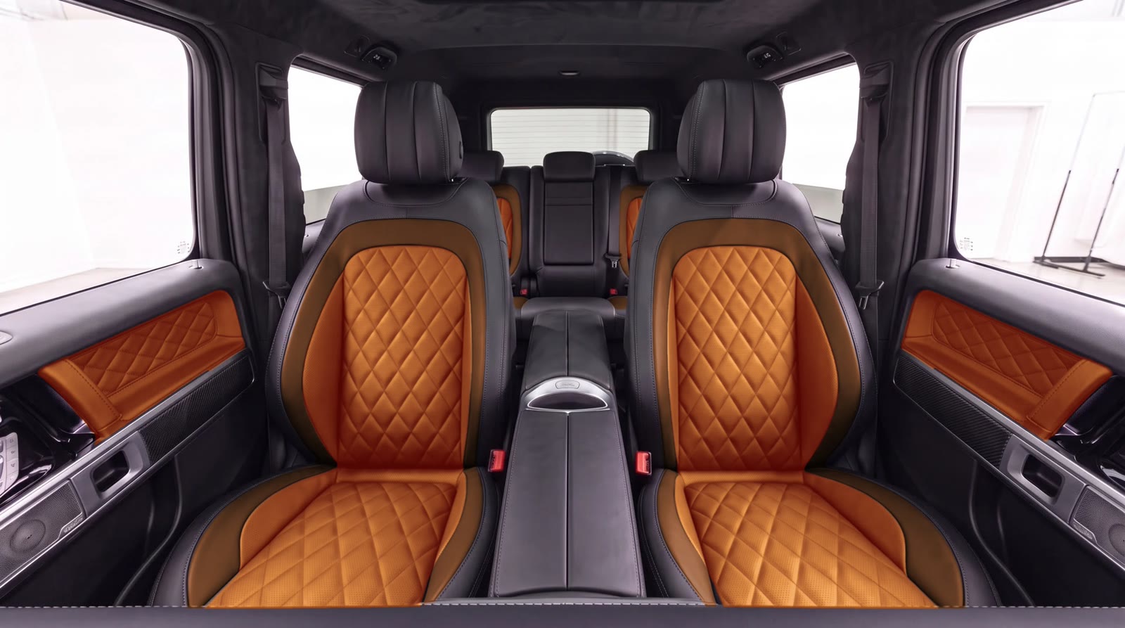 G-Wagon interior visualization: cognac seat centers and door inserts, espresso seat band, classic diamond quilting