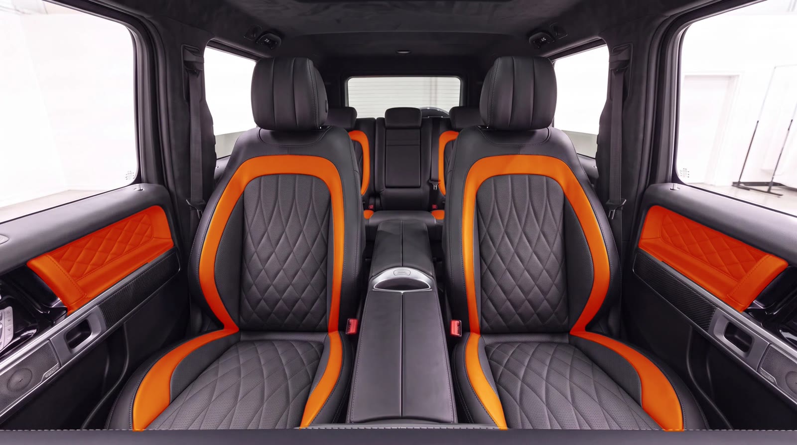 G-Wagon interior visualization: orange seat band and door inserts, factory black AMG seat centers