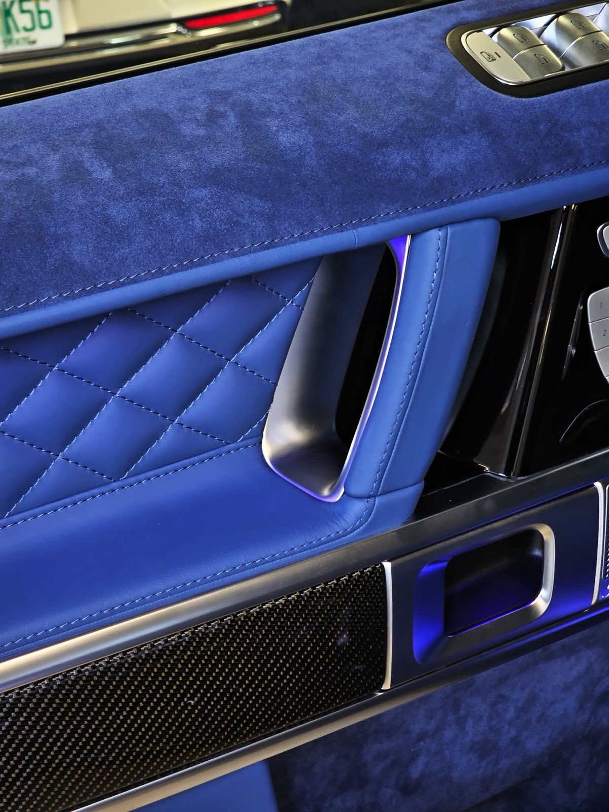 A G-Wagon door in blue Alcantara with a quilted blue leather insert