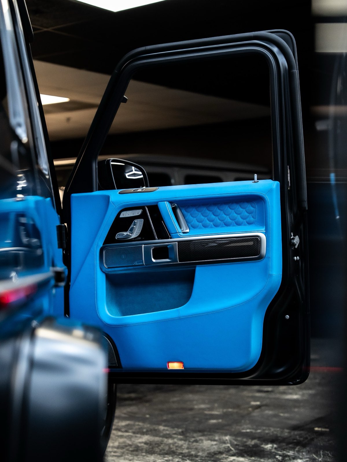 A door panel in bright blue leather
