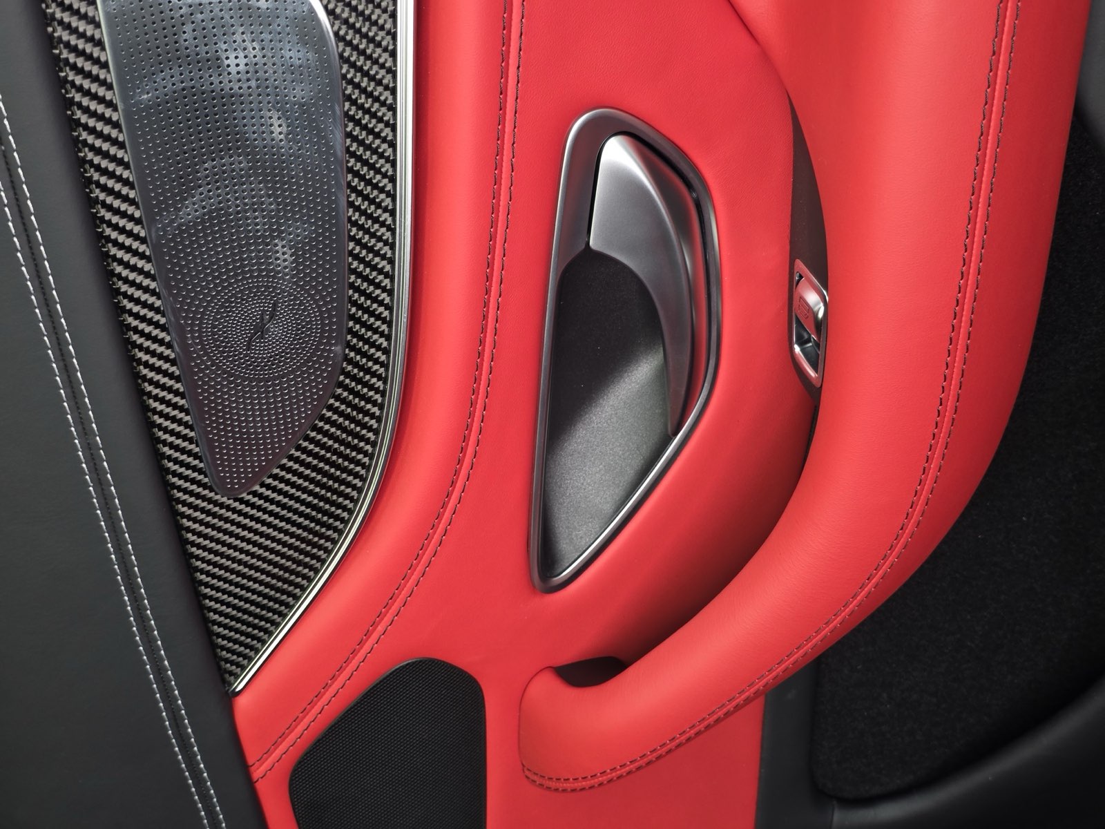 The red door panel around the handle