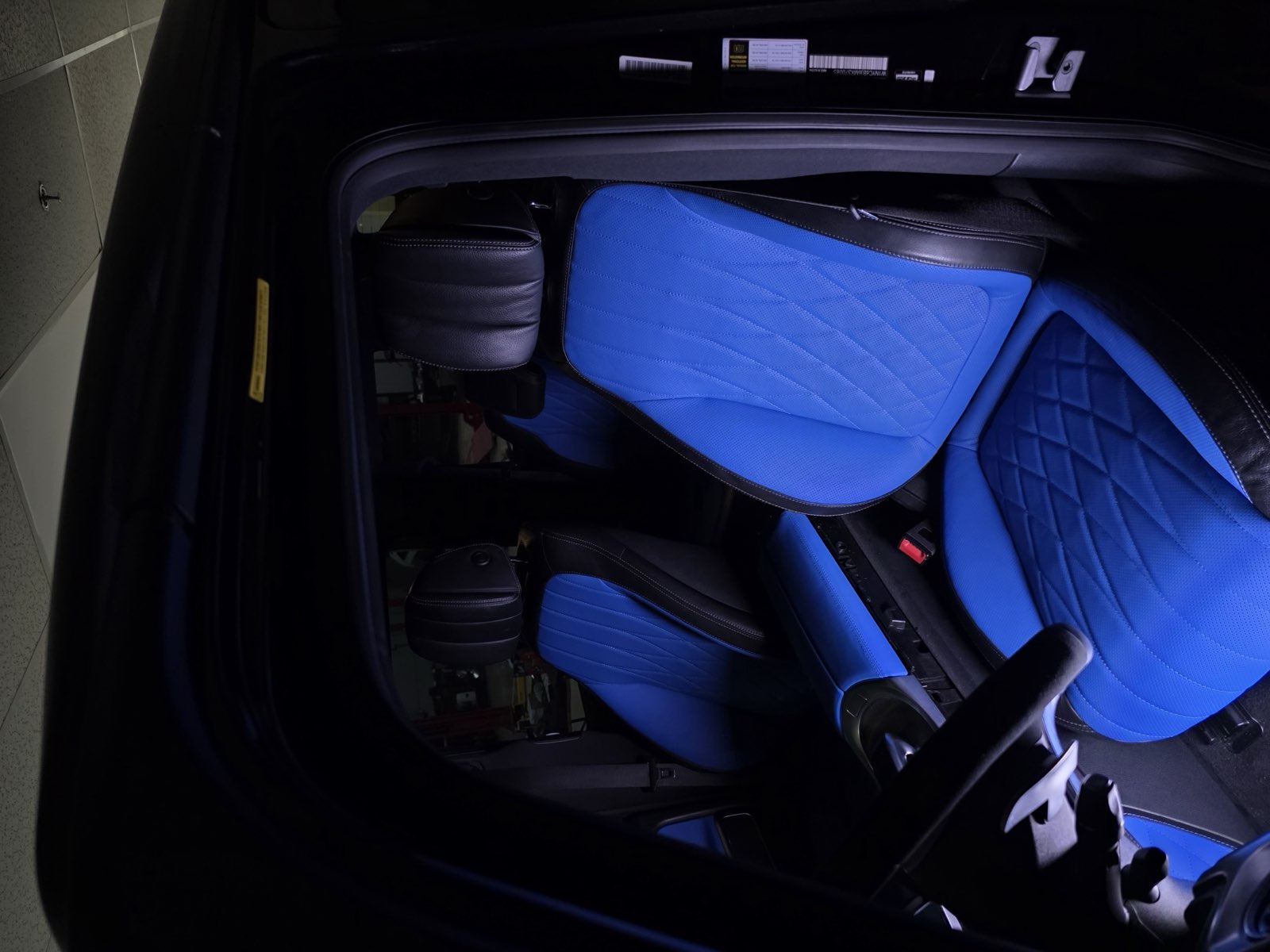Diamond quilting: A bright blue seat, quilted in diamonds.