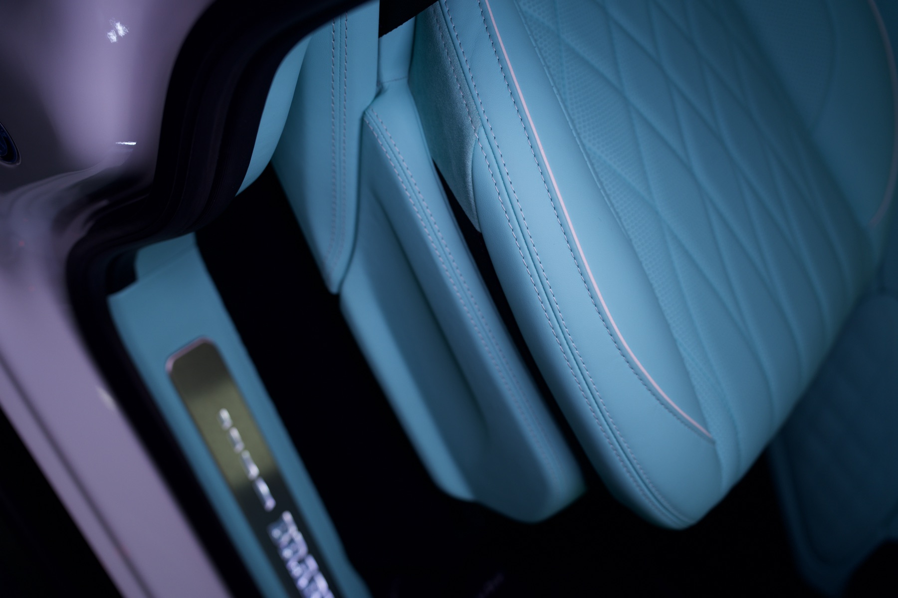 A Tiffany blue seat above the lit sill plate