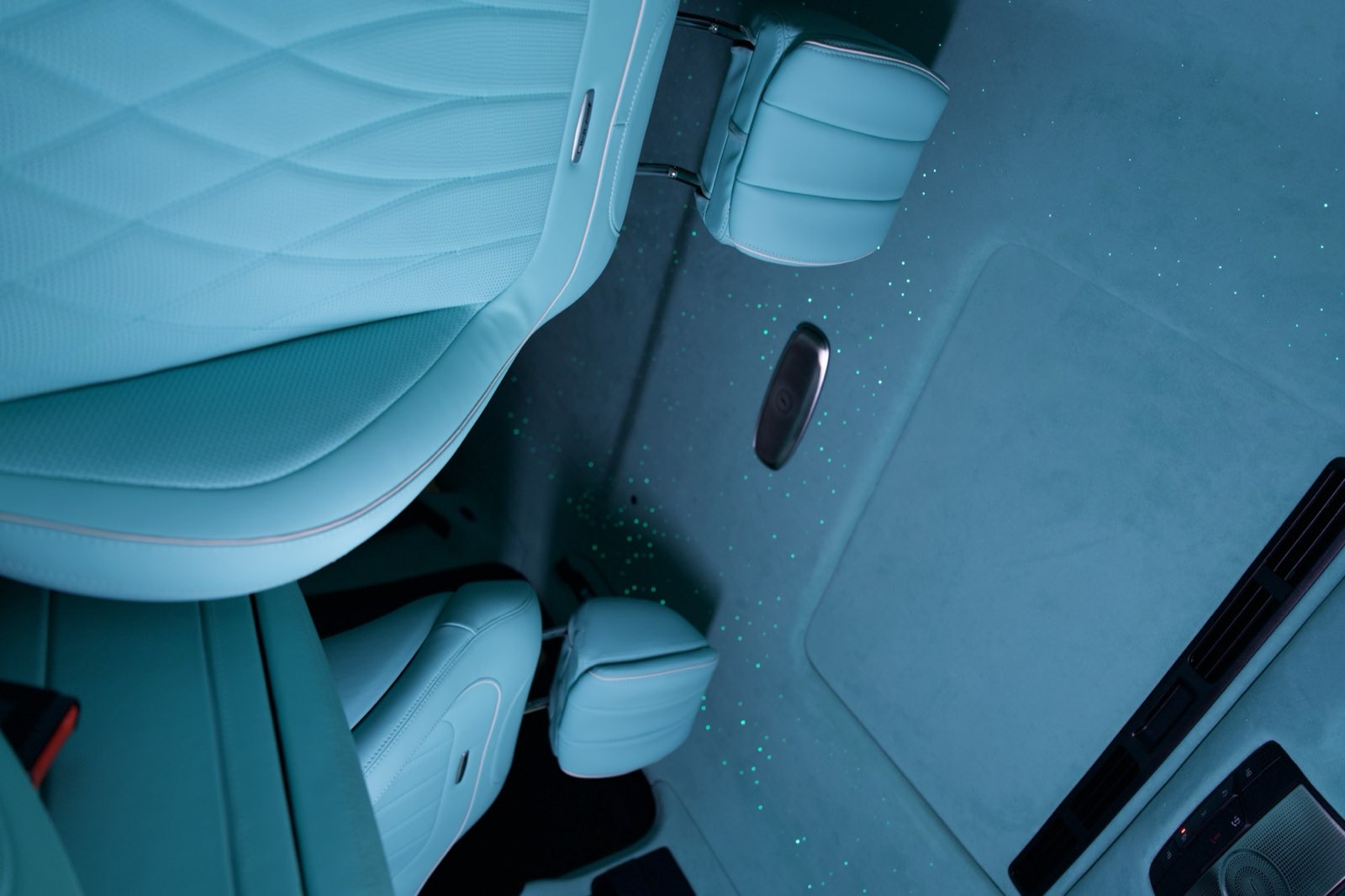 The rear seats of a G-Wagon in Tiffany blue quilted leather