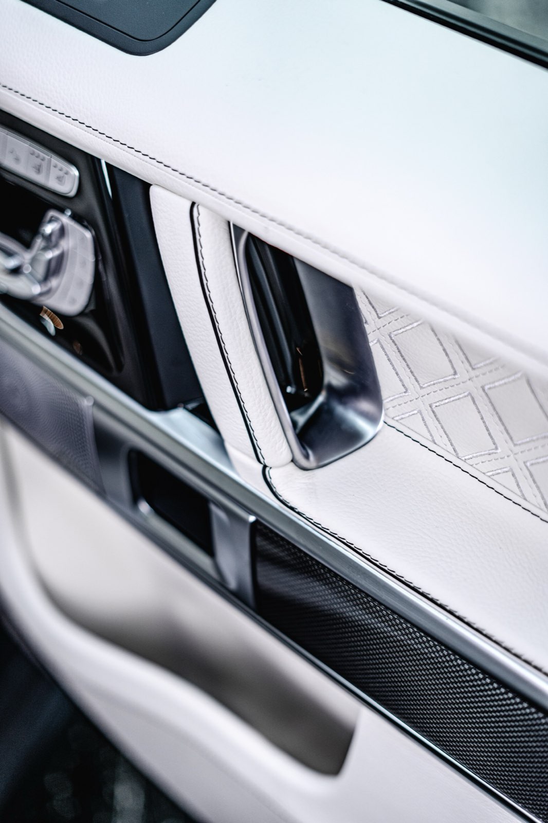 White G-Wagon door: White quilted leather with carbon trim.