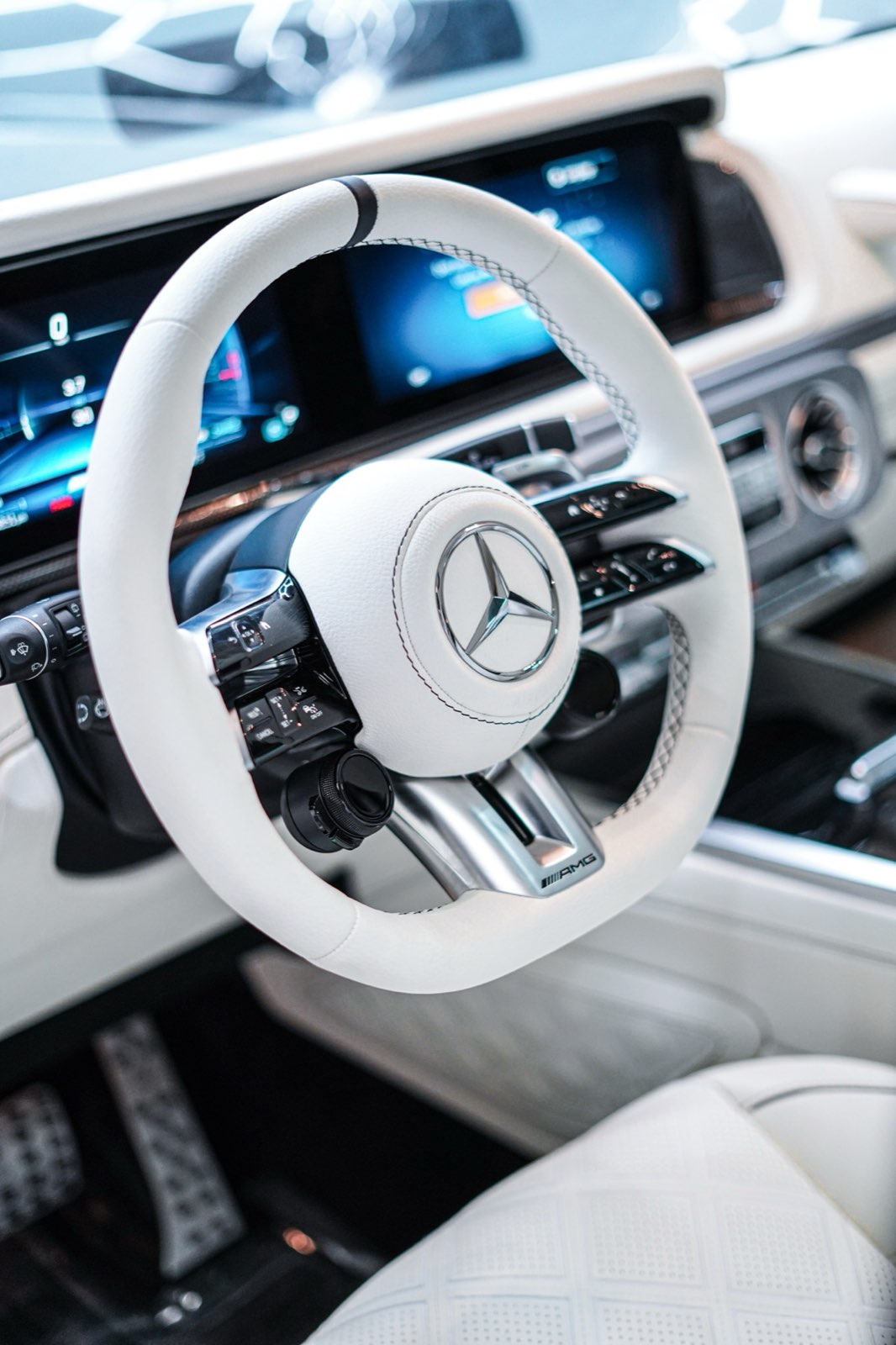 A white leather steering wheel