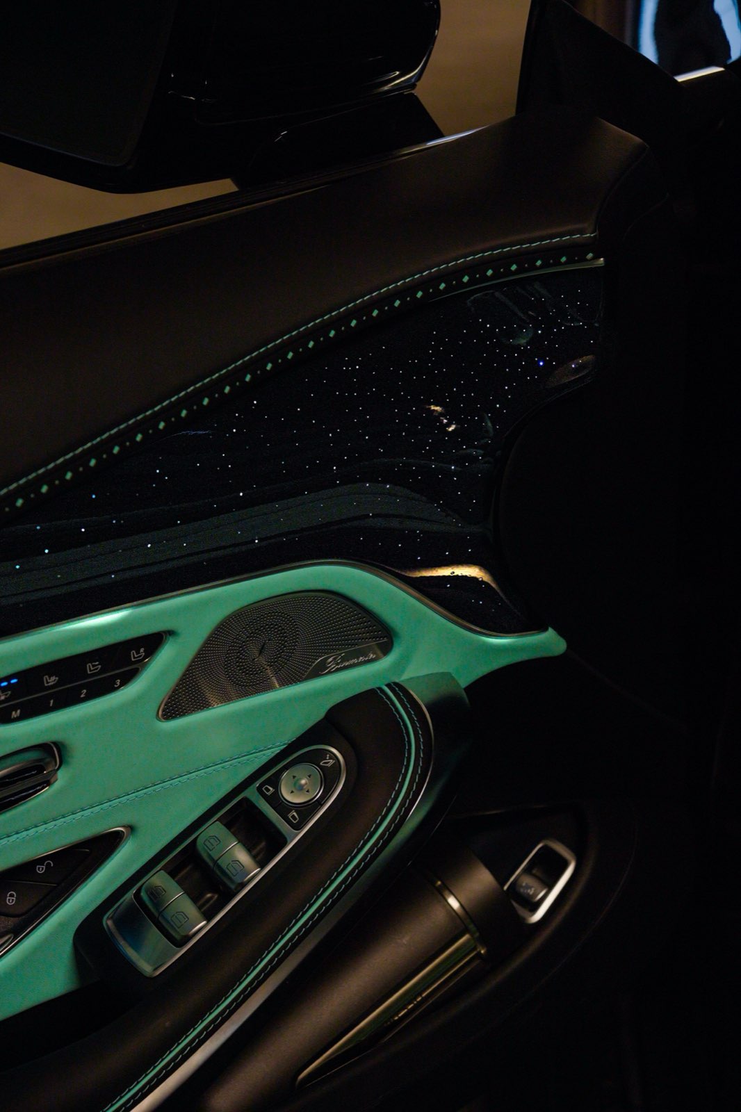 The mint door panel around the handle